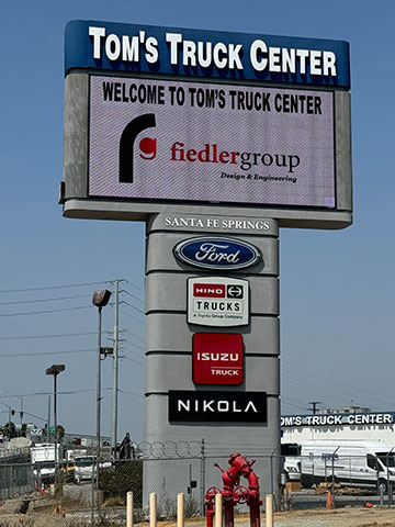 Fiedler Group signage at Tom's Truck Center